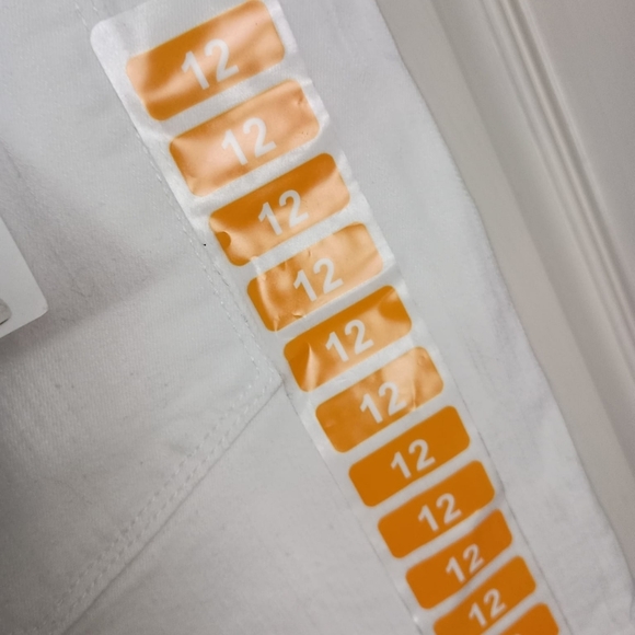 NWT JESSICA SIMPSON SIDE SLIT DENIM SHORTS IN WHITE SIZE 12 - Picture 8 of 9